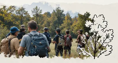 Un groupe explore un paysage forestier &agrave; pied.